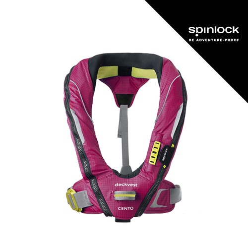 Rozovi prsluk za spašavanje Cento Junior 150N od Spinlock, dizajniran za dječju upotrebu, s jasnim logotipom proizvođača i detaljima koji ukazuju na njegovu funkcionalnost.