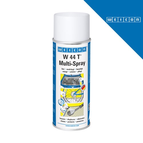 Bijela bočica spreja WEICON W 44 T Multi-Spray s plavim etiketom koja prikazuje primjenu na mehaničkim dijelovima i biciklu, uz tekst na više jezika i logotip proizvođača u gornjem desnom kutu.